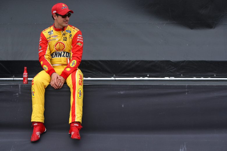 KANSAS CITY, KANSAS - OCTOBER 24: Joey Logano, driver of the #22 Shell Pennzoil Ford, waits backstage during pre-race ceremonies prior to the NASCAR Cup Series Hollywood Casino 400 at Kansas Speedway on October 24, 2021 in Kansas City, Kansas. (Photo by Sean Gardner/Getty Images) | Getty Images