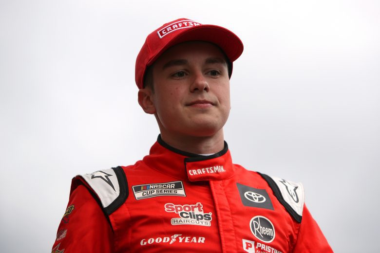 KANSAS CITY, KANSAS - OCTOBER 24: Christopher Bell, driver of the #20 Craftsman Toyota, walks onstage during pre-race ceremonies prior to the NASCAR Cup Series Hollywood Casino 400 at Kansas Speedway on October 24, 2021 in Kansas City, Kansas. (Photo by Sean Gardner/Getty Images) | Getty Images