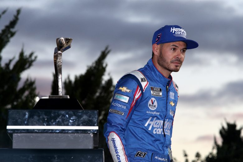 KANSAS CITY, KANSAS - OCTOBER 24: Kyle Larson, driver of the #5 HendrickCars.com Chevrolet, looks on from victory lane after winning the NASCAR Cup Series Hollywood Casino 400 at Kansas Speedway on October 24, 2021 in Kansas City, Kansas. (Photo by Sean Gardner/Getty Images) | Getty Images