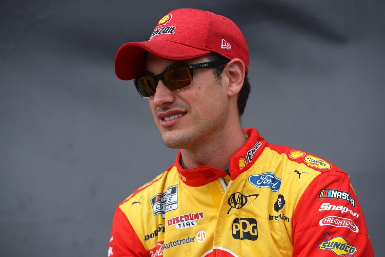 KANSAS CITY, KANSAS - OCTOBER 24: Joey Logano, driver of the #22 Shell Pennzoil Ford, waits backstage during pre-race ceremonies prior to the NASCAR Cup Series Hollywood Casino 400 at Kansas Speedway on October 24, 2021 in Kansas City, Kansas. (Photo by Sean Gardner/Getty Images) | Getty Images