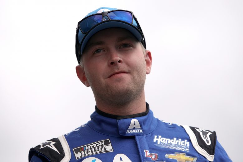 KANSAS CITY, KANSAS - OCTOBER 24: William Byron, driver of the #24 RaptorTough.com Chevrolet, walks onstage during pre-race ceremonies prior to the NASCAR Cup Series Hollywood Casino 400 at Kansas Speedway on October 24, 2021 in Kansas City, Kansas. (Photo by Sean Gardner/Getty Images) | Getty Images