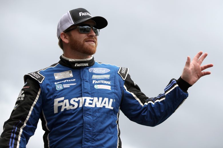 KANSAS CITY, KANSAS - OCTOBER 24: Chris Buescher, driver of the #17 Fastenal Ford, waves to fans during pre-race ceremonies prior to the NASCAR Cup Series Hollywood Casino 400 at Kansas Speedway on October 24, 2021 in Kansas City, Kansas. (Photo by Sean Gardner/Getty Images) | Getty Images