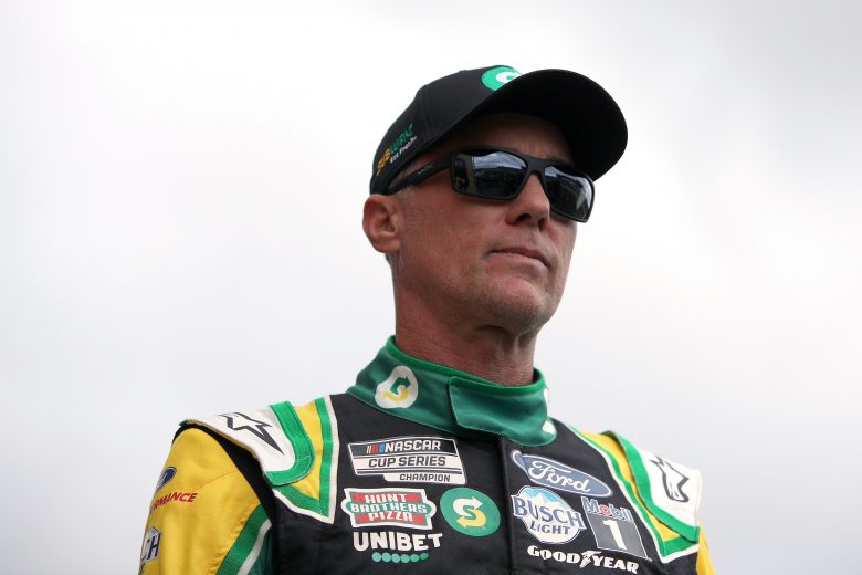 KANSAS CITY, KANSAS - OCTOBER 24: Kevin Harvick, driver of the #4 Subway Delivery Ford, walks onstage during pre-race ceremonies prior to the NASCAR Cup Series Hollywood Casino 400 at Kansas Speedway on October 24, 2021 in Kansas City, Kansas. (Photo by Sean Gardner/Getty Images) | Getty Images