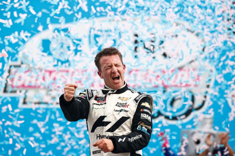 CONCORD, NORTH CAROLINA - OCTOBER 09: AJ Allmendinger, driver of the #16 Hyperice Chevrolet, celebrates in victory lane after winning the NASCAR Xfinity Series Drive for the Cure 250 presented by Blue Cross Blue Shield of North Carolina at Charlotte Motor Speedway on October 09, 2021 in Concord, North Carolina. (Photo by Jared C. Tilton/Getty Images) | Getty Images