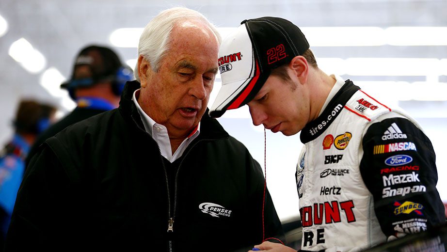 LAS VEGAS, NV - MARCH 09:  Brad Keselowski, driver of the #22 Discount Tire Ford, speaks with team owner Roger Penske in the garage area  during practice for the NASCAR Nationwide Series Sam's Town 300 at Las Vegas Motor Speedway on March 9, 2013 in Las Vegas, Nevada.  (Photo by Tom Pennington/Getty Images) | Getty Images