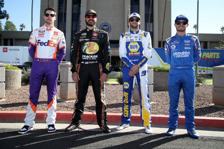 PHOENIX, ARIZONA - NOVEMBER 04: (L-R) NASCAR Cup Series Championship 4, Denny Hamlin, driver of the #11 FedEx Express Toyota, Martin Truex Jr., driver of the #19 a Bass Pro Shops Toyota, Chase Elliott, driver of the #9 NAPA Auto Parts Chevrolet, and Kyle Larson, driver of the #5 HendrickCars.com Chevrolet, pose for photos during the 2021 NASCAR Championship 4 Media Day at the Phoenix Convention Center on November 04, 2021 in Phoenix, Arizona. (Photo by Sean Gardner/Sean Gardner) | Getty Images