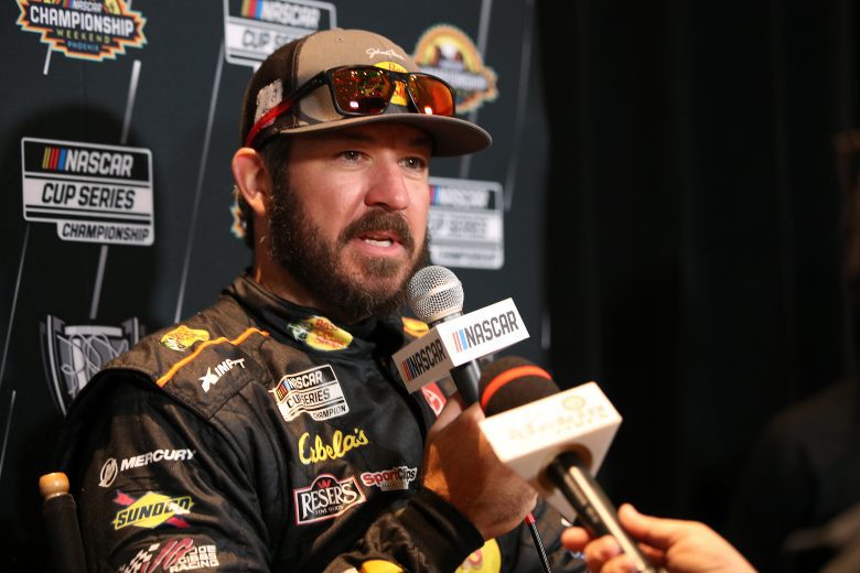 PHOENIX, ARIZONA - NOVEMBER 04: Martin Truex Jr., driver of the #19 a Bass Pro Shops Toyota, speaks to the media during the 2021 NASCAR Championship 4 Media Day at the Phoenix Convention Center on November 04, 2021 in Phoenix, Arizona. (Photo by Meg Oliphant/Getty Images) | Getty Images