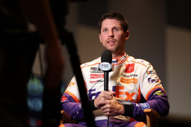 PHOENIX, ARIZONA - NOVEMBER 04: Denny Hamlin, driver of the #11 FedEx Express Toyota, speaks to the media during the 2021 NASCAR Championship 4 Media Day at the Phoenix Convention Center on November 04, 2021 in Phoenix, Arizona. (Photo by Meg Oliphant/Getty Images) | Getty Images