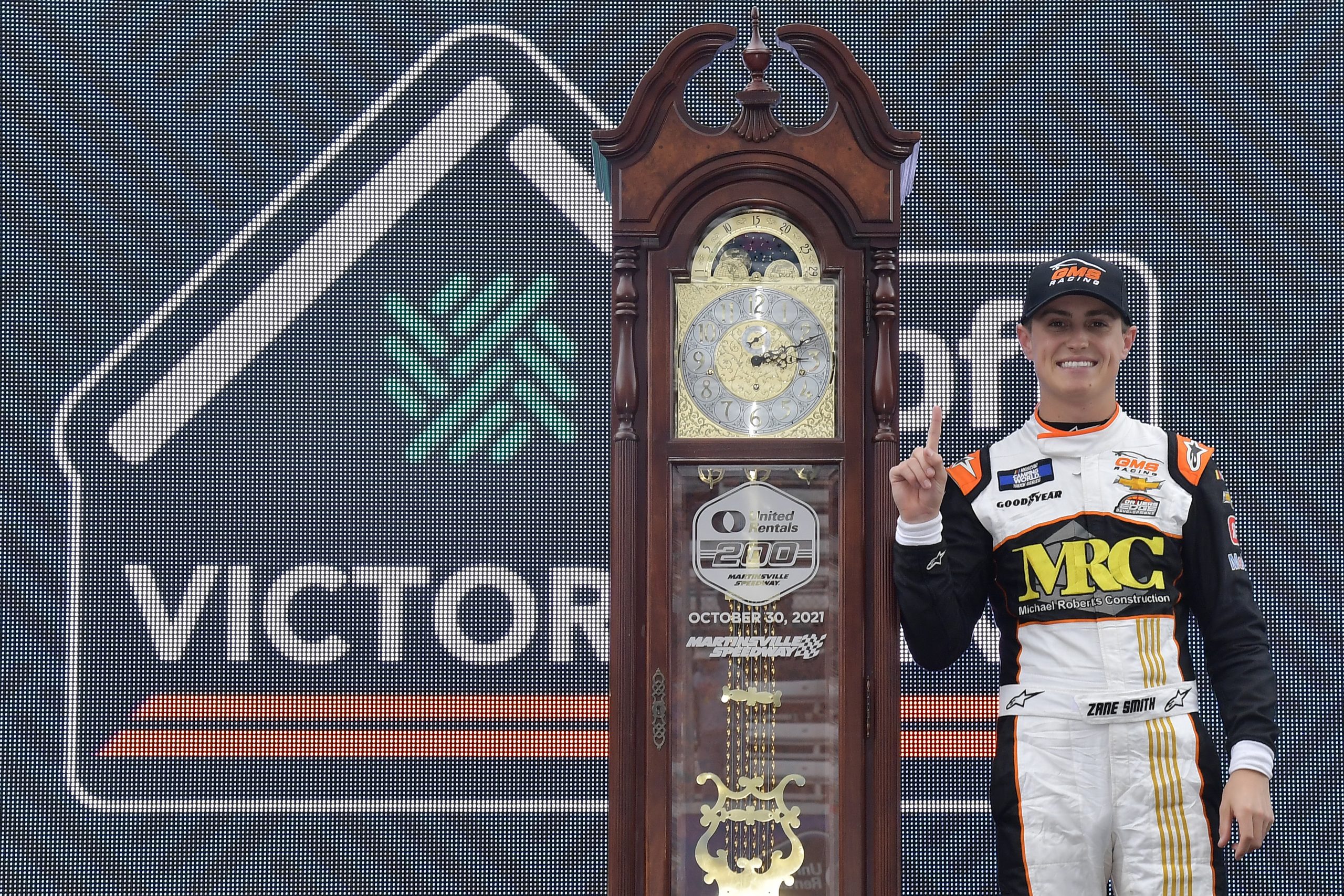 MARTINSVILLE, VIRGINIA - OCTOBER 30: Zane Smith, driver of the #21 MRC Construction Chevrolet, celebrates in the Ruoff Mortgage victory lane after winning the NASCAR Camping World Truck Series United Rentals 200 at Martinsville Speedway on October 30, 2021 in Martinsville, Virginia. (Photo by Logan Riely/Getty Images) | Getty Images