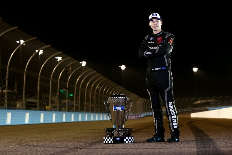 AVONDALE, ARIZONA - NOVEMBER 05: Ben Rhodes, driver of the #99 Bombardier LearJet 75 Toyota, poses for photos after winning the 2021 NASCAR Camping World Truck Series Championship at Phoenix Raceway on November 05, 2021 in Avondale, Arizona. (Photo by Sean Gardner/Getty Images) | Getty Images
