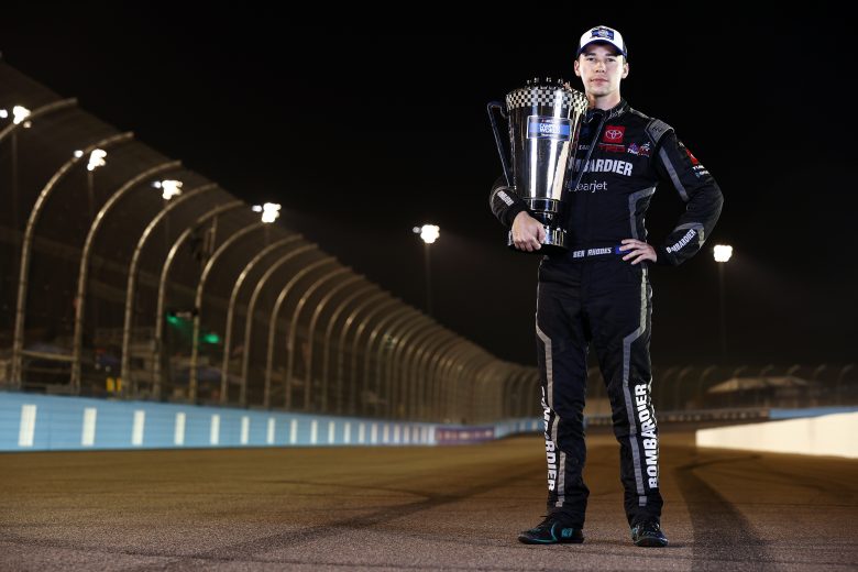 AVONDALE, ARIZONA - NOVEMBER 05: Ben Rhodes, driver of the #99 Bombardier LearJet 75 Toyota, poses for photos after winning the 2021 NASCAR Camping World Truck Series Championship at Phoenix Raceway on November 05, 2021 in Avondale, Arizona. (Photo by Sean Gardner/Getty Images) | Getty Images