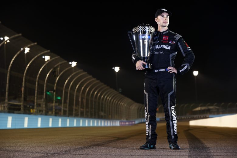 AVONDALE, ARIZONA - NOVEMBER 05: Ben Rhodes, driver of the #99 Bombardier LearJet 75 Toyota, poses for photos after winning the 2021 NASCAR Camping World Truck Series Championship at Phoenix Raceway on November 05, 2021 in Avondale, Arizona. (Photo by Sean Gardner/Getty Images) | Getty Images
