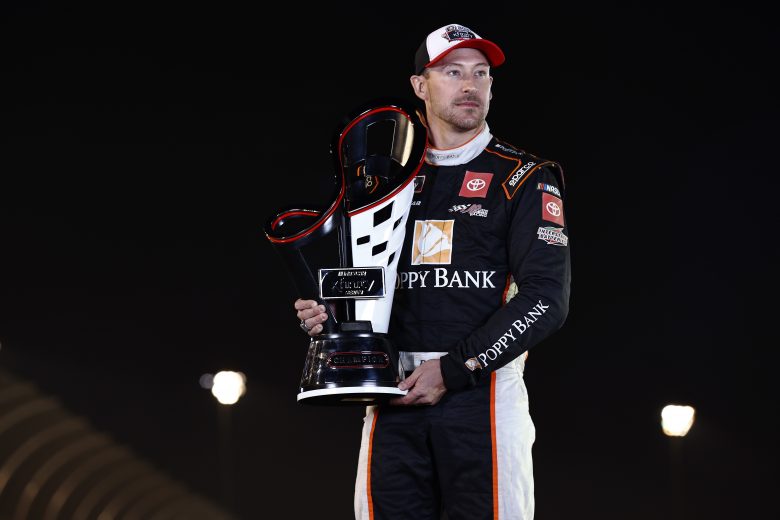 AVONDALE, ARIZONA - NOVEMBER 06: Daniel Hemric, driver of the #18 Poppy Bank Toyota, poses for photos after winning the NASCAR Xfinity Series Championship at Phoenix Raceway on November 06, 2021 in Avondale, Arizona. (Photo by Sean Gardner/Getty Images) | Getty Images