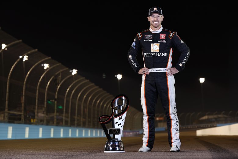 AVONDALE, ARIZONA - NOVEMBER 06: Daniel Hemric, driver of the #18 Poppy Bank Toyota, poses for photos after winning the NASCAR Xfinity Series Championship at Phoenix Raceway on November 06, 2021 in Avondale, Arizona. (Photo by Sean Gardner/Getty Images) | Getty Images