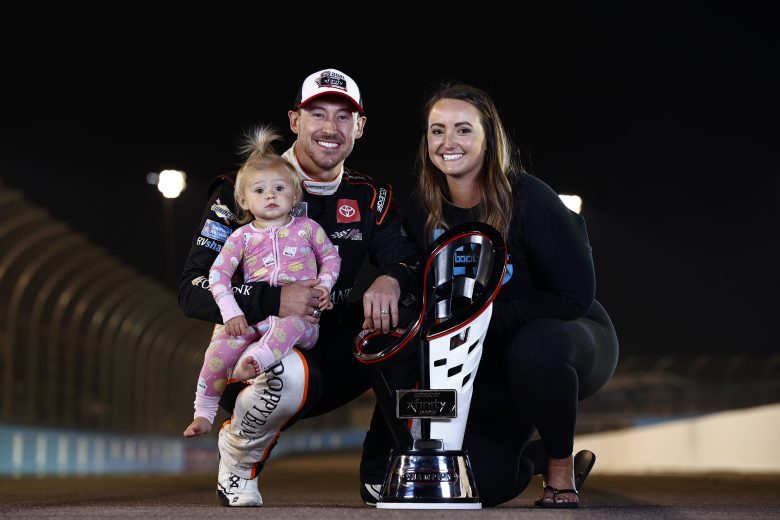 AVONDALE, ARIZONA - NOVEMBER 06: Daniel Hemric, driver of the #18 Poppy Bank Toyota, poses for phots with his wife, Kenzie and daughter, Rhen Haven after winning the NASCAR Xfinity Series Championship at Phoenix Raceway on November 06, 2021 in Avondale, Arizona. (Photo by Sean Gardner/Getty Images) | Getty Images