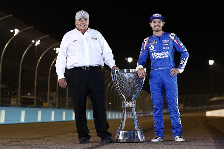 AVONDALE, ARIZONA - NOVEMBER 07: Kyle Larson, driver of the #5 HendrickCars.com Chevrolet, and NASCAR Hall of Famer and team owner Rick Hendrick pose for photos after winning the NASCAR Cup Series Championship at Phoenix Raceway on November 07, 2021 in Avondale, Arizona. (Photo by Sean Gardner/Getty Images) | Getty Images