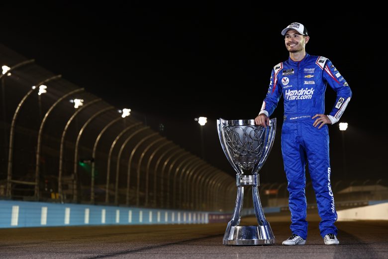 AVONDALE, ARIZONA - NOVEMBER 07: Kyle Larson, driver of the #5 HendrickCars.com Chevrolet, poses for photos after winning the NASCAR Cup Series Championship at Phoenix Raceway on November 07, 2021 in Avondale, Arizona. (Photo by Sean Gardner/Getty Images) | Getty Images