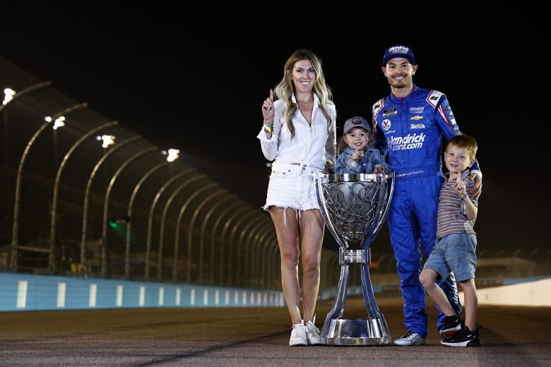 AVONDALE, ARIZONA - NOVEMBER 07: Kyle Larson, driver of the #5 HendrickCars.com Chevrolet, his wife, Katelyn, son,Owen and daughter Audrey pose for photos after the NASCAR Cup Series Championship at Phoenix Raceway on November 07, 2021 in Avondale, Arizona. (Photo by Sean Gardner/Getty Images) | Getty Images