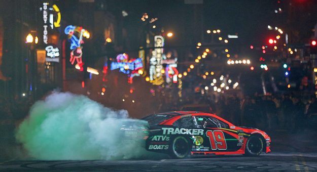 NASHVILLE, TENNESSEE - DECEMBER 04: Martin Truex Jr. performs a burnout during the Monster Energy NASCAR Cup Series Burnouts on Broadway on December 04, 2019 in Nashville, Tennessee. (Photo by Brian Lawdermilk/Getty Images) | Getty Images