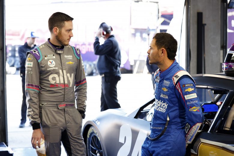 CONCORD, NORTH CAROLINA - NOVEMBER 17: Kyle Larson driver of the #5 Hendrick Motorsports Chevrolet talks with teammate Alex Bowman driver of the #48 Hendrick Motorsports Chevrolet during NASCAR Cup Series Next Gen testing at Charlotte Motor Speedway on November 17, 2021 in Concord, North Carolina. (Photo by Grant Halverson/Getty Images) | Getty Images