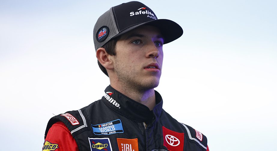 AVONDALE, ARIZONA - NOVEMBER 05: Chandler Smith, driver of the #18 Safelite AutoGlass Toyota, waits on the grid prior to during the NASCAR Camping World Truck Series Lucas Oil 150 at Phoenix Raceway on November 05, 2021 in Avondale, Arizona. (Photo by Jared C. Tilton/Getty Images) | Getty Images