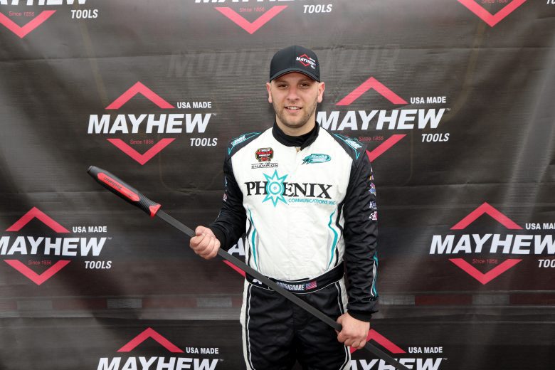 Justin Bonsignore, driver of the #51 Phoenix Communications, Inc. Chevrolet, smiles for a make-up photo prior to the Nu Way Auto Parts 150 for the NASCAR Whelen Modified Tour at New York International Raceway Park in Lancaster, New York on July 31, 2021. (Bryan Bennett/NASCAR)