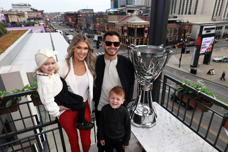 NASHVILLE, TENNESSEE - DECEMBER 01: The 2021 NASCAR Cup Series championship driver, Kyle Larson his wife, Katelyn, son, Owen and daughter Audrey for pose for photos at the Twelve Thirty Club on December 01, 2021 in Nashville, Tennessee. (Photo by Chris Graythen/Getty Images) | Getty Images