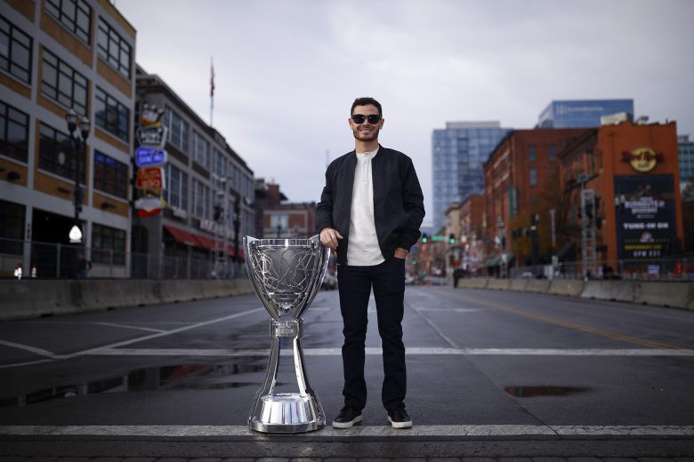 NASHVILLE, TENNESSEE - DECEMBER 01: The 2021 NASCAR Cup Series championship driver, Kyle Larson poses for photos on Broadway December 01, 2021 in Nashville, Tennessee. (Photo by Jared C. Tilton/Getty Images) | Getty Images