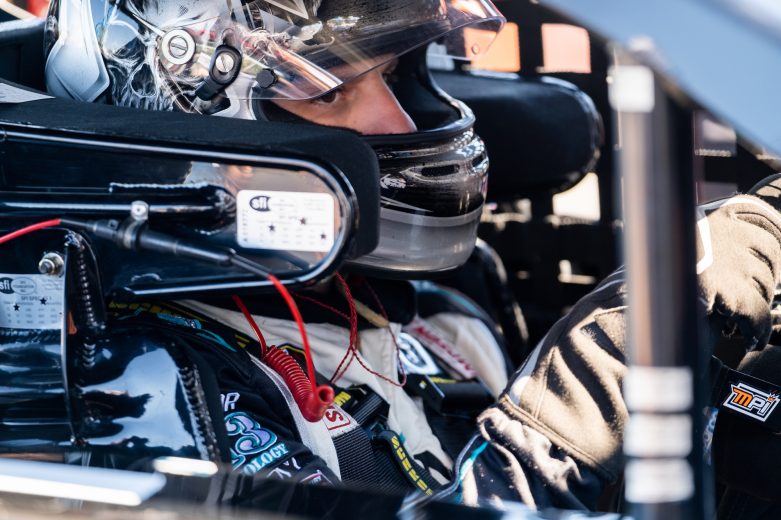 Justin Bonsignore, driver of the #51 Phoenix Communications Chevrolet, waits inside his car as crew members make adjustments during practice before the NAPA Fall Final for the NASCAR Whelen Modified Tour at Stafford Motor Speedway in Stafford, Connecticut on September 25, 2021. (Ryan McBride/NASCAR)