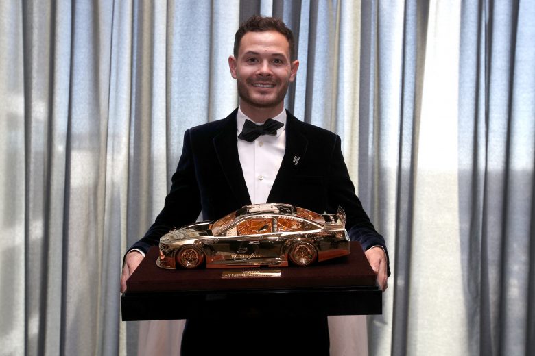NASHVILLE, TENNESSEE - DECEMBER 01: 2021 NASCAR Cup Series championship driver, Kyle Larson receives the Goodyear Gold Car during a reception at The Joseph prior to the NASCAR Champion's Banquet on December 01, 2021 in Nashville, Tennessee. (Photo by Sean Gardner/Getty Images) | Getty Images