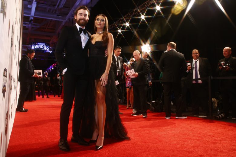 NASHVILLE, TENNESSEE - DECEMBER 02:  NASCAR Cup Series driver Ryan Blaney and guest Gianna Tulio pose on the red carpet prior to the NASCAR Champion's Banquet at the Music City Center on December 02, 2021 in Nashville, Tennessee. (Photo by Jared C. Tilton/Getty Images) | Getty Images