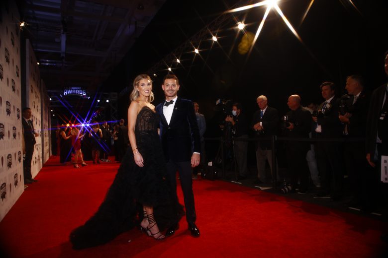 NASHVILLE, TENNESSEE - DECEMBER 02:  2021NASCAR Cup Series championship driver, Kyle Larson, wife Katelyn Larson pose on the red carpet prior to the NASCAR Champion's Banquet at the Music City Center on December 02, 2021 in Nashville, Tennessee. (Photo by Jared C. Tilton/Getty Images) | Getty Images