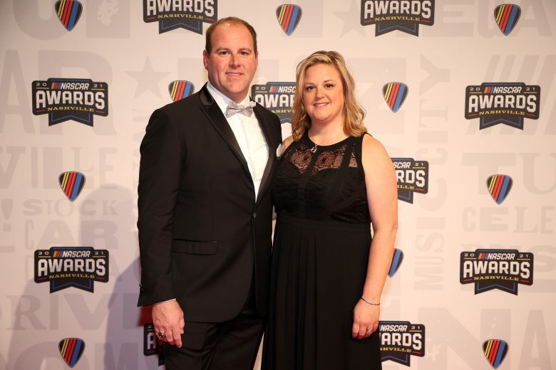 NASHVILLE, TENNESSEE - DECEMBER 02:  2021 NASCAR Advance Auto Parts Weekly Series championship driver, Peyton Sellers and Jennie Sellers pose on the red carpet prior to the NASCAR Champion's Banquet at the Music City Center on December 02, 2021 in Nashville, Tennessee. (Photo by Chris Graythen/Getty Images) | Getty Images