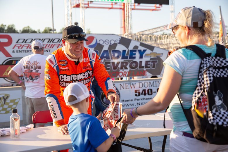 Peyton Sellers interacts with fans during the NASCAR Advanced Auto Parts Weekly Series at Dominion Raceway on September 18, 2021 in Woodford, Virginia. (Parker Michels-Boyce/NASCAR)