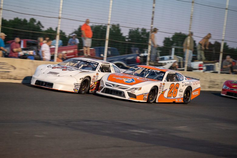 Peyton Sellers (26) and Landon Pembelton (0) in the Late Model race during the NASCAR Advanced Auto Parts Weekly Series at Dominion Raceway on September 18, 2021 in Woodford, Virginia. (Parker Michels-Boyce/NASCAR)