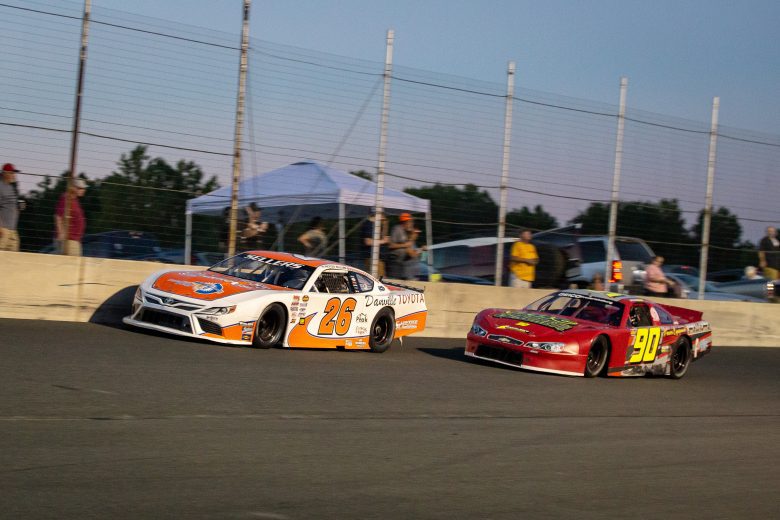 Peyton Sellers (26) and John Goin (90) in the Late Model race during the NASCAR Advanced Auto Parts Weekly Series at Dominion Raceway on September 18, 2021 in Woodford, Virginia. (Parker Michels-Boyce/NASCAR)