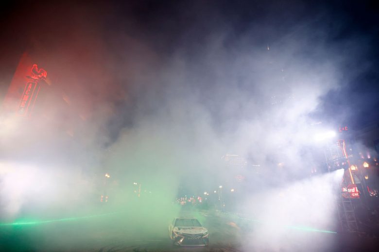 NASHVILLE, TENNESSEE - DECEMBER 01:  Denny Hamlin, driver of the #11 NASCAR Cup Series Toyota performs a burnout during the Burnouts on Broadway December 01, 2021 in Nashville, Tennessee. (Photo by Jared C. Tilton/Getty Images) | Getty Images