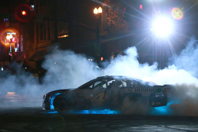NASHVILLE, TENNESSEE - DECEMBER 01:  Kevin Harvick, driver of the #4 NASCAR Cup Series Ford performs a burnout during the Burnouts on Broadway December 01, 2021 in Nashville, Tennessee. (Photo by Sean Gardner/Getty Images) | Getty Images