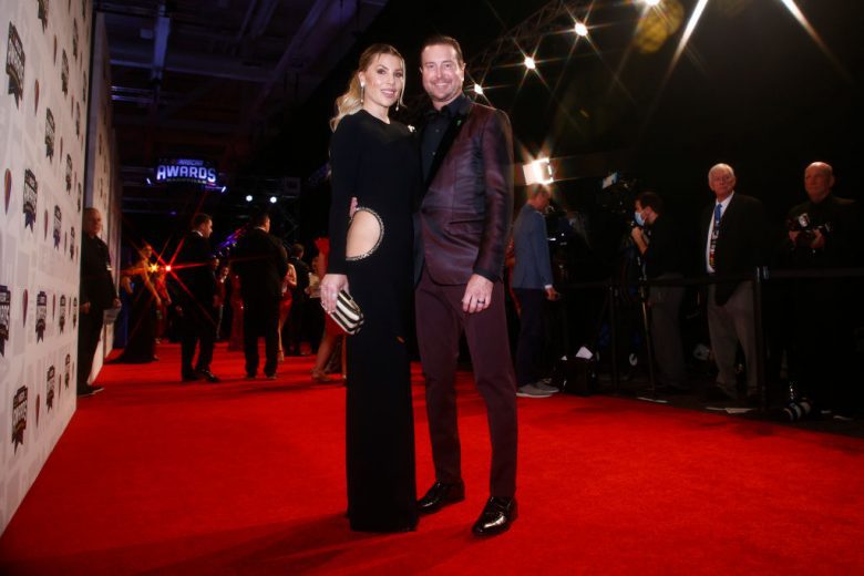 NASHVILLE, TENNESSEE - DECEMBER 02:  NASCAR Cup Series driver Kurt Busch and wife Ashley Busch pose on the red carpet prior to the NASCAR Champion's Banquet at the Music City Center on December 02, 2021 in Nashville, Tennessee. (Photo by Jared C. Tilton/Getty Images) | Getty Images