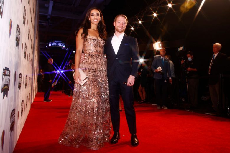 NASHVILLE, TENNESSEE - DECEMBER 02:  NASCAR Cup Series driver Tyler Reddick and guest Alexa De Leon pose on the red carpet prior to the NASCAR Champion's Banquet at the Music City Center on December 02, 2021 in Nashville, Tennessee. (Photo by Jared C. Tilton/Getty Images) | Getty Images