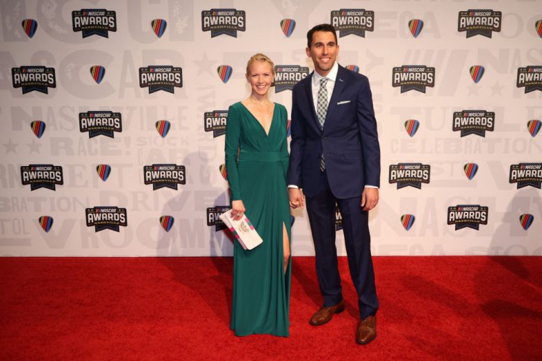 NASHVILLE, TENNESSEE - DECEMBER 02:  NASCAR Cup Series driver Aric Almirola and wife Janice Almirola pose on the red carpet prior to the NASCAR Champion's Banquet at the Music City Center on December 02, 2021 in Nashville, Tennessee. (Photo by Chris Graythen/Getty Images) | Getty Images