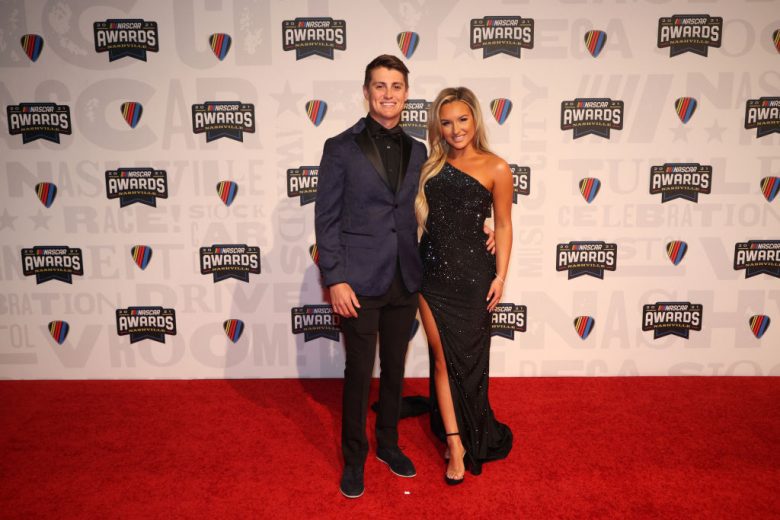 NASHVILLE, TENNESSEE - DECEMBER 02:  NASCAR Camping World Truck Series driver Zane Smith and guest pose on the red carpet prior to the NASCAR Champion's Banquet at the Music City Center on December 02, 2021 in Nashville, Tennessee. (Photo by Chris Graythen/Getty Images) | Getty Images