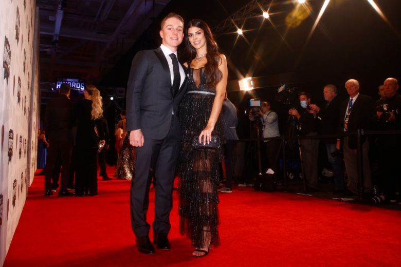 NASHVILLE, TENNESSEE - DECEMBER 02:  NASCAR Cup Series driver John H Nemechek and wife Taylor Nemechek pose on the red carpet prior to the NASCAR Champion's Banquet at the Music City Center on December 02, 2021 in Nashville, Tennessee. (Photo by Jared C. Tilton/Getty Images) | Getty Images