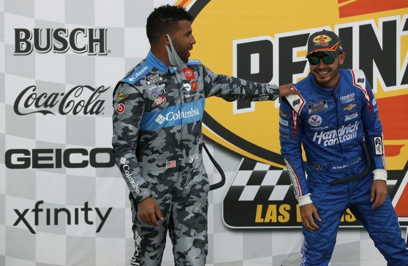 LAS VEGAS, NEVADA - MARCH 07: Kyle Larson, driver of the #5 HendrickCars.com Chevrolet, is congratulated by Bubba Wallace, driver of the #23 Columbia Sportswear Toyota, in Victory Lane after winning the NASCAR Cup Series Pennzoil 400 presented by Jiffy Lube at the Las Vegas Motor Speedway on March 07, 2021 in Las Vegas, Nevada. (Photo by Chris Graythen/23XI Racing via Getty Images)
