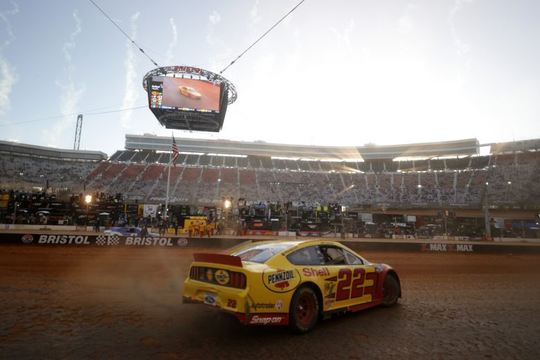 BRISTOL, TENNESSEE - MARCH 29: Joey Logano, driver of the #22 Shell Pennzoil Ford, celebrates with a burnout after winning the NASCAR Cup Series Food City Dirt Race at Bristol Motor Speedway on March 29, 2021 in Bristol, Tennessee. (Photo by Jared C. Tilton/Getty Images) | Getty Images