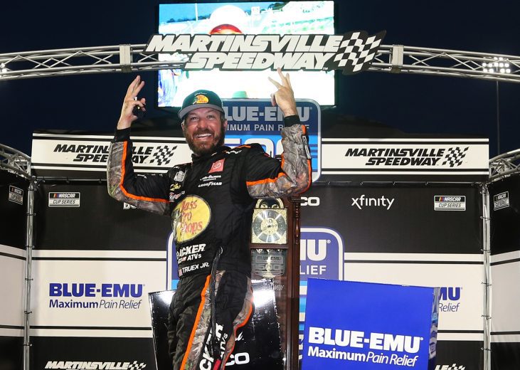 MARTINSVILLE, VIRGINIA - APRIL 11: Martin Truex Jr., driver of the #19 Bass Pro Toyota, celebrates in victory lane after winning the NASCAR Cup Series Blue-Emu Maximum Pain Relief 500 at Martinsville Speedway on April 11, 2021 in Martinsville, Virginia. (Photo by Brian Lawdermilk/Getty Images) | Getty Images