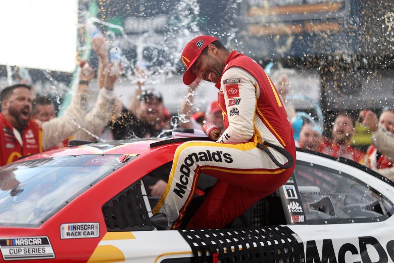 TALLADEGA, ALABAMA - OCTOBER 04: Bubba Wallace, driver of the #23 McDonald's Toyota, celebrates in the Ruoff Mortgage victory lane after winning the rain-shortened NASCAR Cup Series YellaWood 500 at Talladega Superspeedway on October 04, 2021 in Talladega, Alabama. (Photo by Chris Graythen/Getty Images) | Getty Images