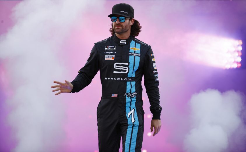 RICHMOND, VIRGINIA - SEPTEMBER 11: Corey LaJoie, driver of the #7 Shavelogic Chevrolet, waves to fans during pre-race ceremonies prior to the NASCAR Cup Series Federated Auto Parts 400 Salute to First Responders at Richmond Raceway on September 11, 2021 in Richmond, Virginia. (Photo by Jared C. Tilton/Getty Images) | Getty Images
