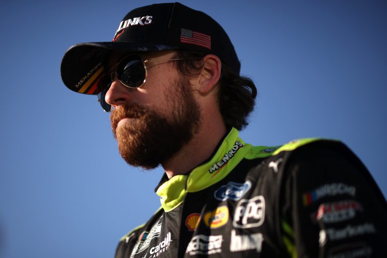 AVONDALE, ARIZONA - NOVEMBER 06: Ryan Blaney, driver of the #12 Menards/Jack Links Ford, walks the grid during qualifying for the NASCAR Cup Series Championship at Phoenix Raceway on November 06, 2021 in Avondale, Arizona. (Photo by Chris Graythen/Getty Images) | Getty Images