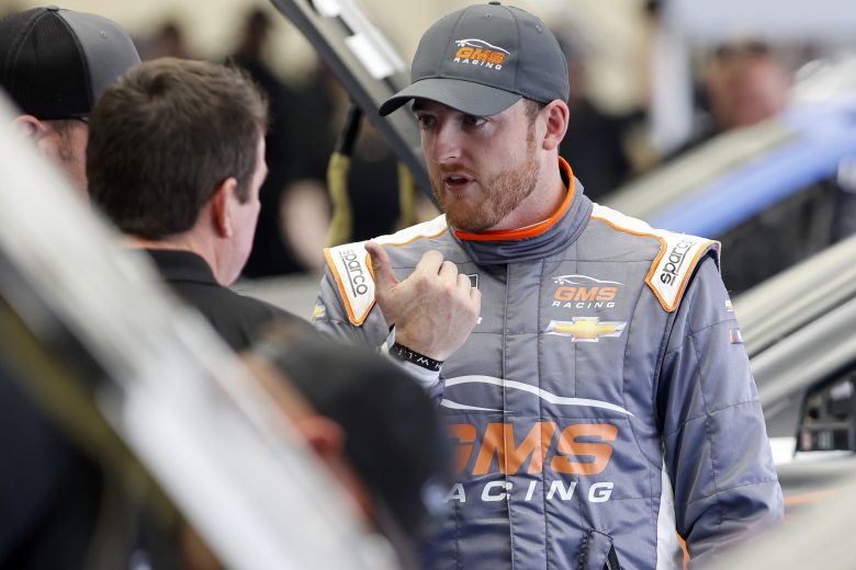 CONCORD, NORTH CAROLINA - OCTOBER 11: Ty Dillon driver of the #94 Next Gen car talks with crew in the garage area during the NASCAR Cup Series test at the Charlotte Motor Speedway on October 11, 2021 in Concord, North Carolina. (Photo by Bob Leverone/Getty Images) | Getty Images